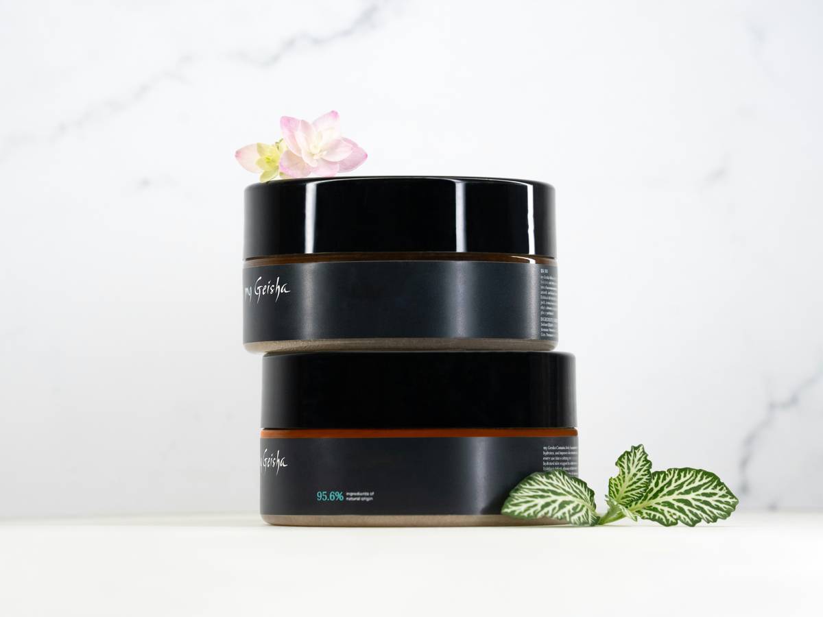 Close-up of an eco-friendly wine bottle showcasing its certification labels